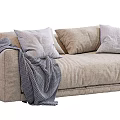Cozy Beige Fabric Sectional Sofa With Soft Pillows And Knitted Throw Blanket