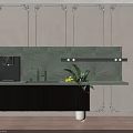 Sleek Black Washbasin with Modern Faucet on Green Speckled Countertop and Green Plant