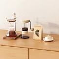 Coffee Tableware Set With Glass Dripper French Press Bean Bag And Cup On Wooden Table