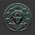 Ancient Bronze Circular Plaque Featuring Detailed Female Head With Scroll Patterns 3d model
