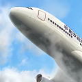 Large White Passenger Plane Flying Through Blue Sky With White Clouds And Smoke