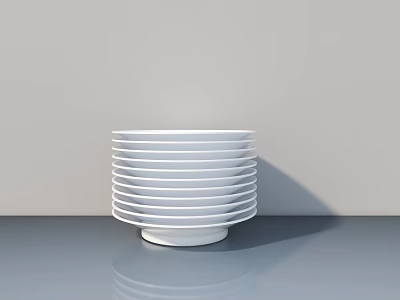 Minimalist White Decorative Ornament Set With Stacked Plates On Modern Tabletop 3d model