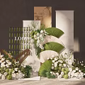 Elegant Wedding Floral Arrangement With Fan Decor And Logo Display Backdrop