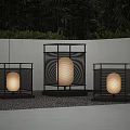 Modern Outdoor Lights With Black Frames Round Lantern Shades And Warm Glow In Garden