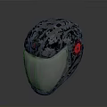Futuristic Weapon Helmet Featuring Black Textured Surface And Red Decorative Accents
