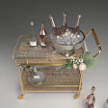 Golden Bar Cart With Champagne Bottles Wine Glasses Ice Bucket And Floral Decorations