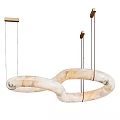 Ivory Marble Chandelier With Interlocking Ring Design Suspended By Black Cords And Golden Mounts