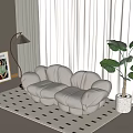 Modern Cream Lounge Chair With Cloud-like Curved Design Floor Lamp Green Plant And Rug