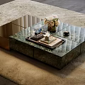 Elegant Coffee Table With Green Marble Top And Gold Frame On Beige Rug Featuring Flowers And Candles