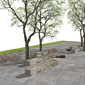 Stone Outdoor Chairs in Park Setting with Trees Brick Pavement and People Around