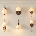 Decorative Wall Lamps With Multiple Designs White Shades And Brown Bases Mounted On Wall