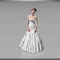 Woman In Strapless White Wedding Dress With Flower Hair Accessory On Gray Background