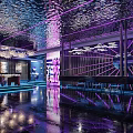 Modern Bar Interior Design With Purple Lighting Mirrored Ceiling Bar Counter And Seating