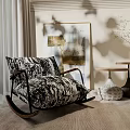 Black and White Patterned Rocking Chair in Modern Interior with Side Tables Plant and Art