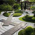 Elegant Residential Landscape with Curved Stone Pathway Neatly Trimmed Hedges and Covered Patio Area