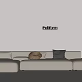 White Sectional Sofa with White Brown and Black Cushions Against Beige Wall Poliform