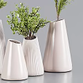 White Conical Striped Vases with Various Green Natural Plants and Fresh Foliage