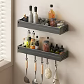 Organized Kitchen Spice Bottles On Wall Mounted Shelves With Cooking Utensils
