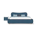 Blue Upholstered Kids Bed With Curved Headboard And White Bedside Table