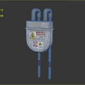 Silver Cased Industrial Equipment With Warning Labels And Curved Pipes