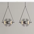 Modern Double Chandelier Design With Metal Frames And Transparent Spherical Shades