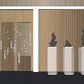 Black Carved Sculptures Display On Transparent Pedestals With Wooden Vertical Slat Wall