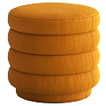Multicolored Stacked Round Ottomans in Orange Blue Green with Soft Gray Blanket