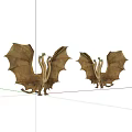 Two Golden Winged Dragon Sculptures With Detailed Features And Artistic Design