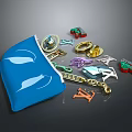 Colorful Metal Charms of Various Shapes Scattered from Blue Pouch with Chain