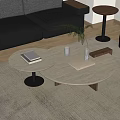 Modern Round Coffee Table With White Marble Top Black Base Green Plant Books And Glass