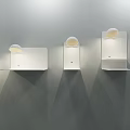 Modern Minimalist Wall Lamps Design With Round Shade And Shelf Mounted on Gray Wall