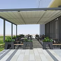 Outdoor Leisure Area With Canopy Tables Chairs Green Plants Paved Floor And Grass