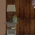 Brown Leather Single Sofa In Living Room With Wooden Wall Fireplace And Bookshelf Decor