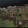 Residential Buildings With Red Tile Roofs Yellow Beige Exteriors Vines On Walls And Green Trees