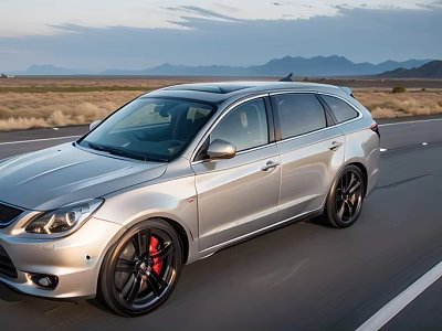 Silver Wagon Driving on Open Road with Black Wheels Red Brake Calipers and Mountain Scenery 3d model