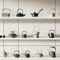 Stylish Various Tea Pots Arranged On White Shelves With Light Walls And Small Plants