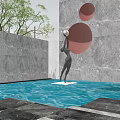 Black Sculpture Holding White Sphere By Gray Stone Wall With Circular Openings Water And Greenery