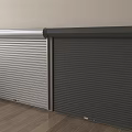 Light And Dark Gray Roller Shutters Installed On Wall With Wooden Floor