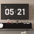 Modern TV Stand With TV Showing Time Decorative Items Potted Plant And Open Book