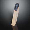 Wood Stone Piece with Burnt End and Natural Grain on Dark Reflective Background