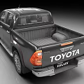 Toyota Hilux Black Pickup Truck With Sleek Exterior Design And Alloy Wheels
