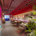 Modern Stylish Restaurant Interior With Neon Lights Red Walls Dining Tables And Display Shelves