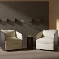 Lounge Area With Gray Wall Two Beige Armchairs Round Table Plant Floor Lamp And Carpet