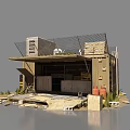 Rustic Converted Container Structure With Storage Crates Barrels Stones And Weeds