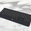 Black Slim Computer Keyboard With Orange Lettering And Standard Key Layout 3d model