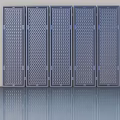 Five Dark Metal Doors With Diamond Grid Pattern Neatly Arranged On Reflective Floor 3d model