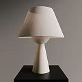 Modern Minimalist Table Lamp With Linen Shade And White Cone Shaped Base On Black Table