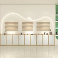 Modern Boutique Store With Green Shelves Gold Frames Circular Mirrors White Walls And Marble Counter