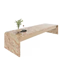 Elegant Modern Bar Counter With Marble Top Golden Accents And Green Plant Decor