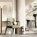 Modern Green Accent Chair With Abstract Wall Art Floor Lamp Potted Plant And Figurine